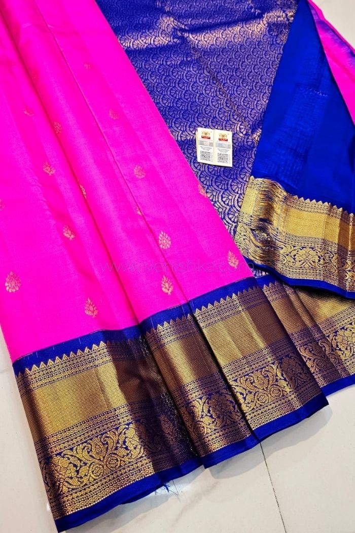 Vibrant Pink Kanjivaram Silk Saree with Royal Blue Pallu and Korvai Border